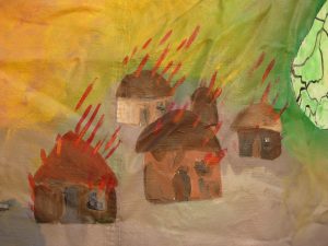 Burning village drawn by a child